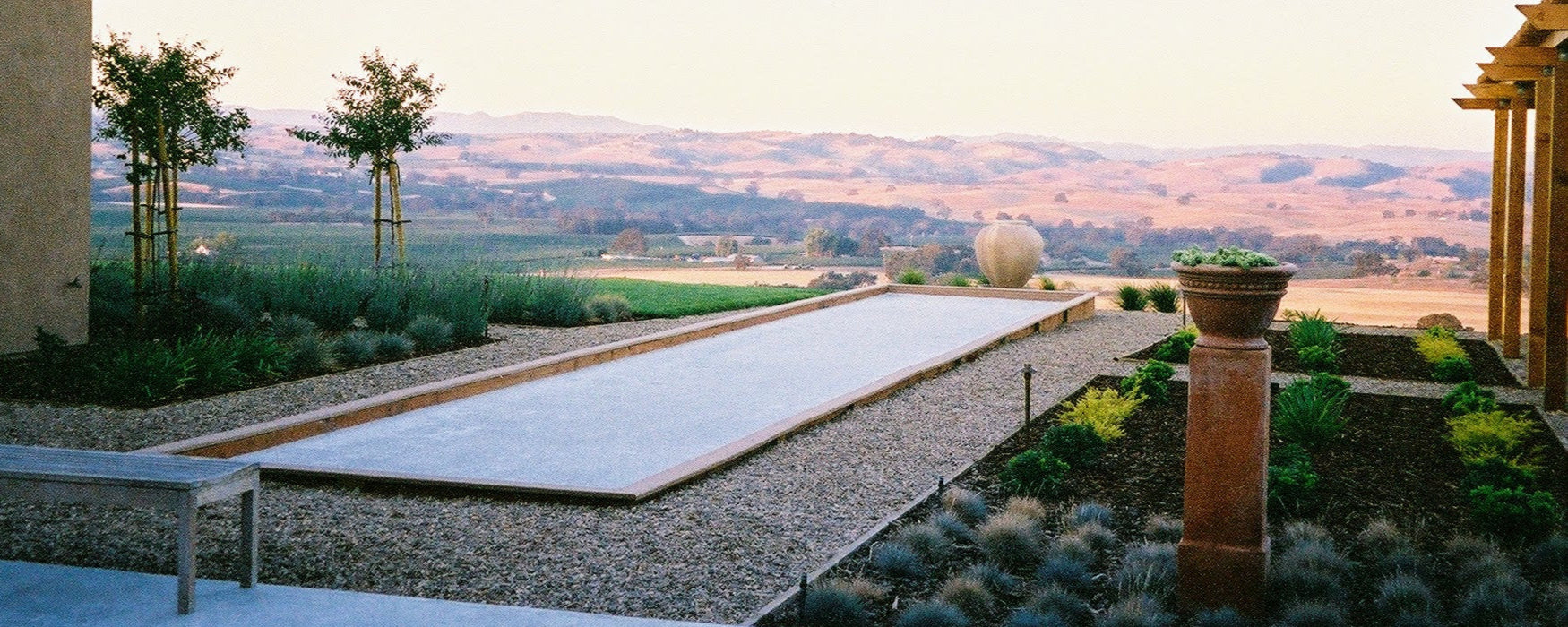 Boccemon oyster shell bocce court overlooking a valley